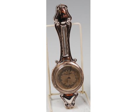 An Art Nouveau miniature silver two dial aneroid wheel barometer, having a typical silvered dial, maker Henry Matthews, Birmi