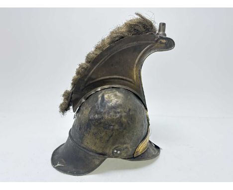 FRENCH GENDARMERIE TYPE HELMET, MID TO LATE 19TH CENTURY in brass, with loose comb retaining partial mohawk, embossed helmet 