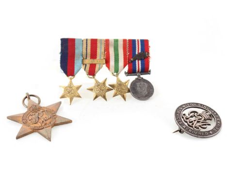 THREE WWII MEDALS, ALONG WITH A SET OF MINIATURES the three comprising the 1939-1945 Star, the Africa Star and the Italy Star