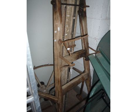A VINTAGE SEED DRILL, E Thomas & Co, Oswestry nameplate attached