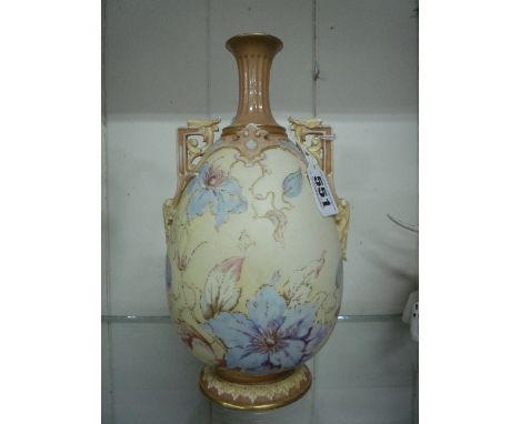 A ROYAL WORCESTER PORCELAIN VASE, shape no 1539, with narrow neck and pierced angular handles, florally decorated on blush iv