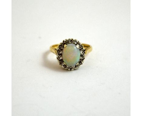 A 9CT GOLD OPAL AND DIAMOND RING, size N 1/2