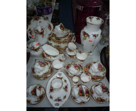 A ROYAL ALBERT 'OLD COUNTRY ROSES' DINNERWARES, large boxed vase and a trinket dish (over sixty pieces)