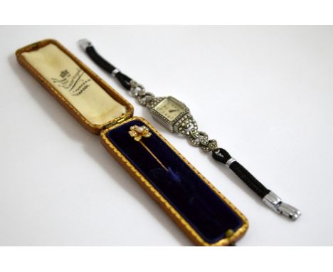 TWO ITEMS, to include a Marcasite cocktail watch together with a clover shape pearl stick pin, with fitted box