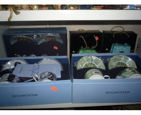 THREE BOXED WEDGWOOD 'MILLENIUM' COLLECTION CUPS/SAUCERS, together with two boxed Annie Rowe novelty teapots shaped as handba