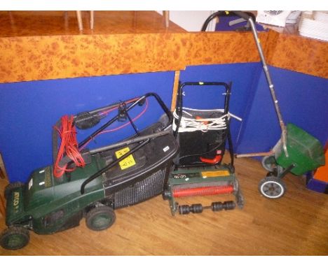 A RICHMOND 32 ROTARY LAWNMOWER, a seeder, a Black and Decker airer and a Coopers rotovator (4)