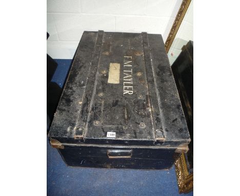 A PAINTED TIN TRUNK AND CONTENTS, the top marked F M Tayler