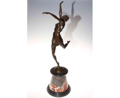 Large bronze model of a dancing girl on marble plinth.