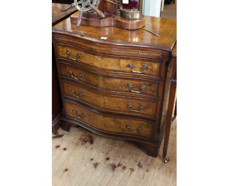 Burr walnut and mahogany serpentine front chest having brush slide above four long drawers on bracket feet, 78cm by 72cm.