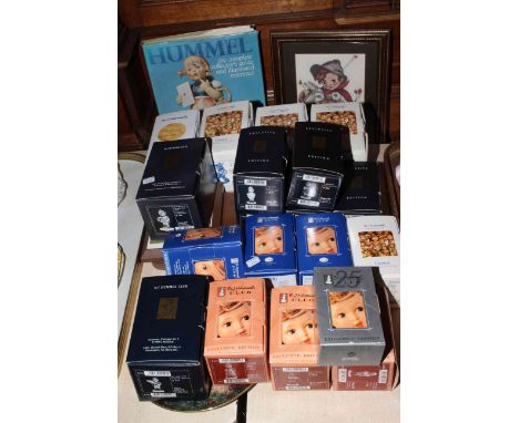Collection of nineteen boxed Hummel figures, together with collectors book, etc.