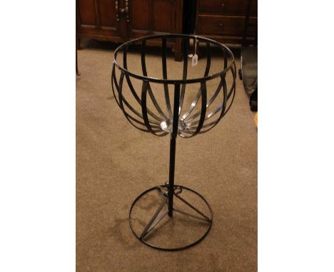 Circular pedestal garden planter, pair hay racks, print of a lady and wall mirror (5).