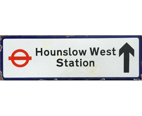Flanged enamel DIRECTIONAL STREET SIGN 'Hounslow West Station' with arrow and London Transport bullseye. Probably a local aut