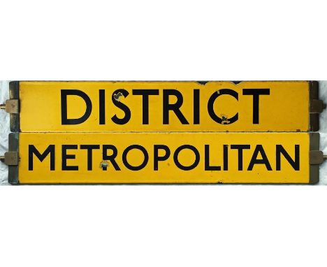 London Underground O/P/Q-Stock enamel DESTINATION PLATE reading 'District' on one side and 'Metropolitan' on the other. Black