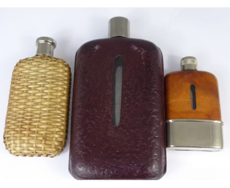 Three Vintage Gentleman's Hip Flasks, the first bound in maroon leather, the second a bamboo weave and the third and smallest