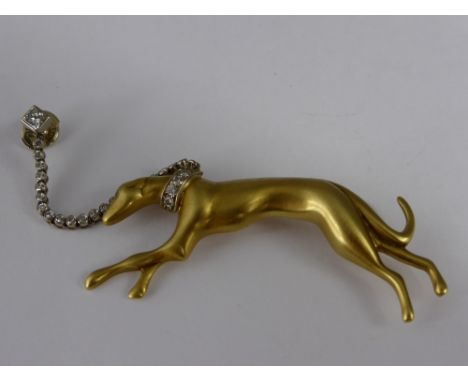 An 18 ct Yellow Gold and Diamond Greyhound Brooch, the the greyhound sporting a diamond collar with safety chain diamond stud
