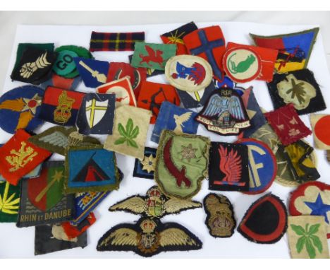 A Large Miscellaneous Collection of Military and other shoulder cloth badges, including tank regiments, RAF, RSR etc., togeth