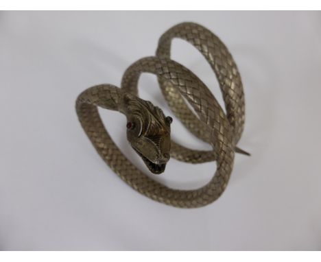 A Vintage Silver Snake Bracelet, the bracelet having garnet eyes.