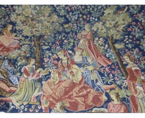 A Vintage Tapestry depicting a Medieval Scene, 100 x 65 cms together with two tasseled tapestry table runners. (3)
