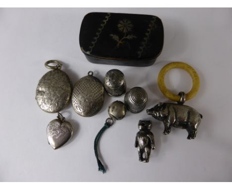 Miscellaneous Silver Items including two silver thimbles, three silver lockets, silver metal teething ring in the form of a p