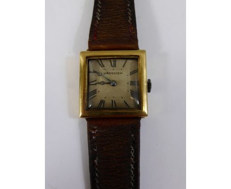 A Gentleman's Italian Gold Cased Art Deco Wrist Watch, the case nr 51598 m.m L.H, the watch having a square engine turned fac