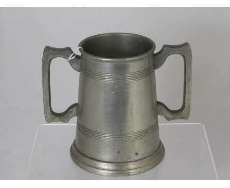 A Cornish Pewter Large Vintage twin handled glass bottomed pewter tankard by G Dixon & Son.