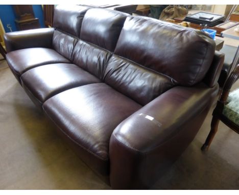 A Contemporary Brown Leather Three Seater Sofa. The sofa measures approx. 250 x 95 x 94 cms. 