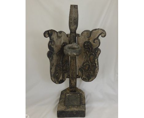 A Wooden Dayak Tribal Offering Light Stand, depicted standing with open wings, approx 70 cms high. 