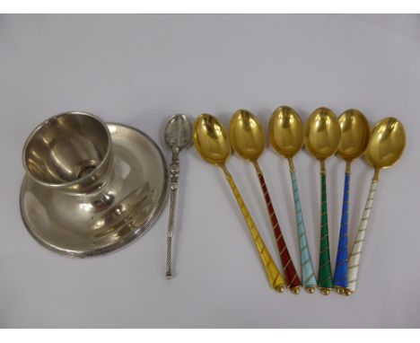 Six Danish Silver and Enamel Coffee Spoons, stamped 925 together with an egg cup stamped silver and a single silver teaspoon,