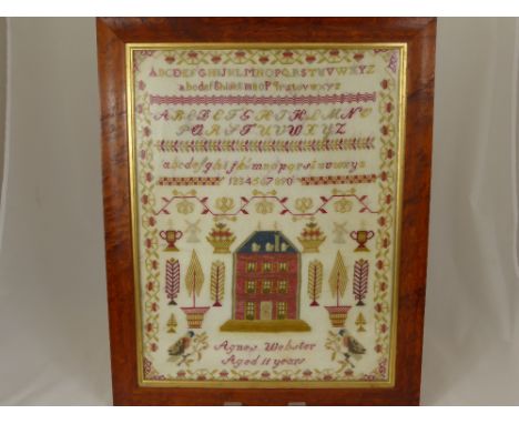 A Late Victorian Wool Sampler depicting letters of the alphabet, Agnes Webster, 11 years, approx. 38 x 50 cms.