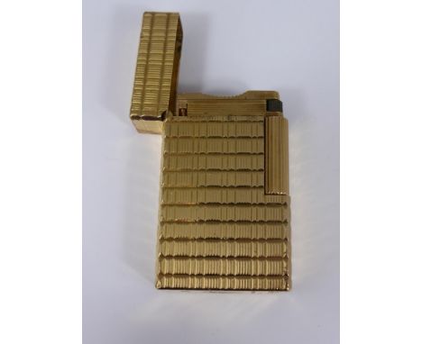 A Vintage Dupont Gold Plated Lighter.