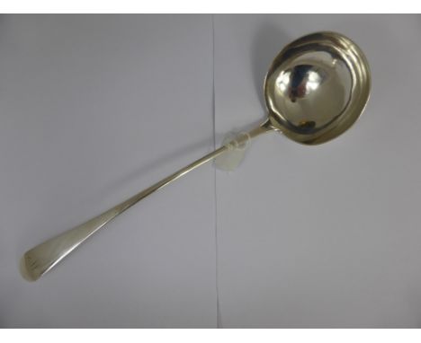 A solid silver Georgian punch ladle.