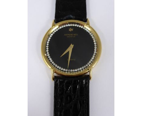 A Gentleman's Raymond Weil Quartz Wrist Watch, the watch 18 k gold plated.
