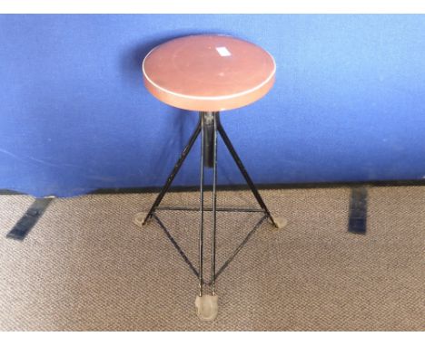 A 1960's Adjustable Stool having a black metal framed base.