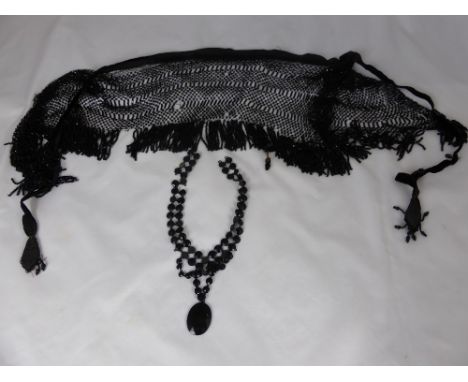 A Vintage Jet Necklace together with a a delicate jet shoulder shawl (2).