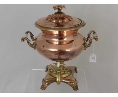 A Vintage Copper Semovar with decorative handles and pouring spout, approx. 37 x 35 cms.
