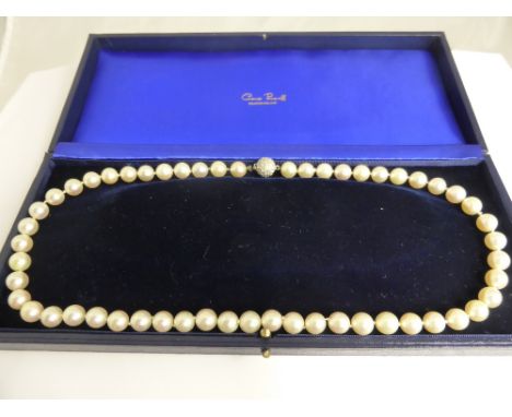 A Cultured Pearl Necklace, the necklace strung with 50 x 0.9 mm pearls with a pave set 18 carat gold diamond ball clasp, appr