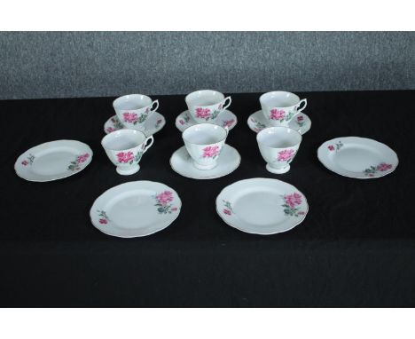 Chinese cups, saucers and plates. Made in China for the export market. Mid twentieth century. Dia.16cm. (largest) 