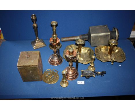 A quantity of brass and copper including chambersticks, tea caddy, horse brasses, etc