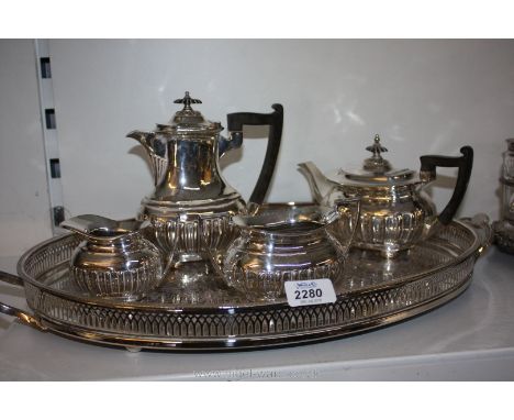 A Walker and Hall silver plate four piece Tea service with a Cavalier oval galleried Tray