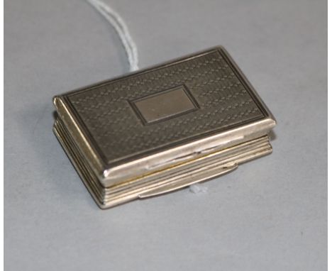 A George IV engine turned silver vinaigrette, by Thomas Shaw, Birmingham, 1826, 38mm.