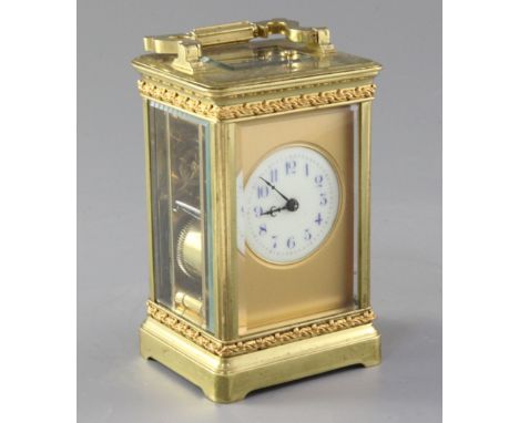 An Edwardian hour repeating gilt brass carriage clock, 13.5cm