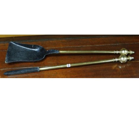 Cast metal and brass fire tools to include poker and shovel (2)They are both 90cms in length