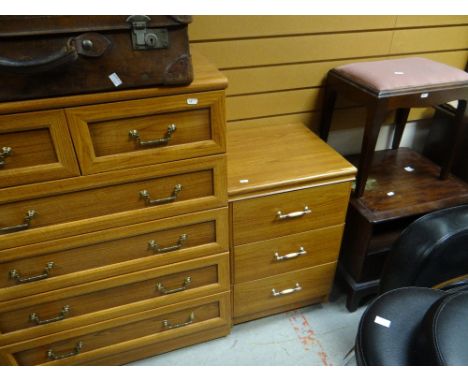 A Stag Minstrel tri-fold mirror dressing table and matching night cabinet and stool together with believed Stag chest of four