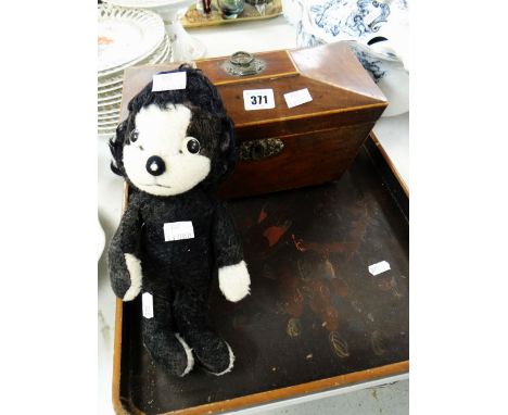 A nineteenth century mahogany sarcophagus tea caddy, a vintage Merrythought character soft toy and a lacquer tray Condition r