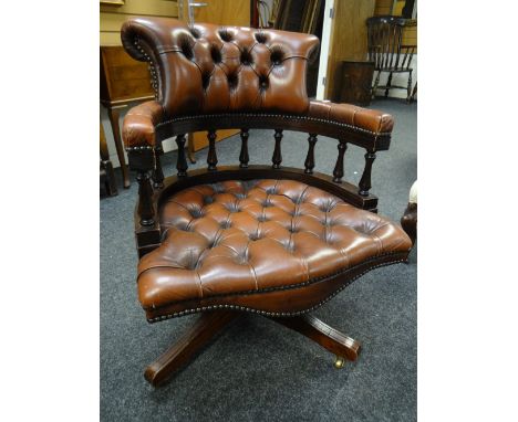 Twentieth century leather button back captain's swivel office chair Condition reports provided on request by email for this a
