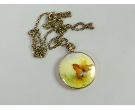 9ct yellow gold framed Royal Worcester porcelain pendant painted with a single perched robin, signed Condition reports provid