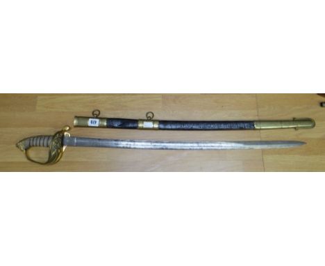 An antique British Naval Officer's sword having wire bound fish grip handle with lion's head pommel, sweeping basket hilt wit