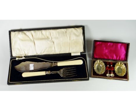 Cased silver plated fish knife and fish server and fork together with cased EPNS pair of salts and spoons (2) Condition repor