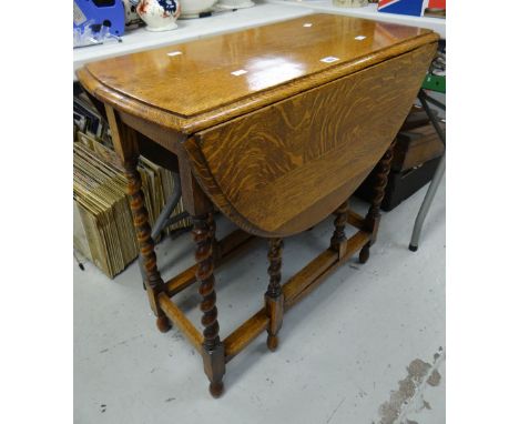 A good vintage oak barley-twist gate-leg table Condition reports provided on request by email for this auction otherwise item