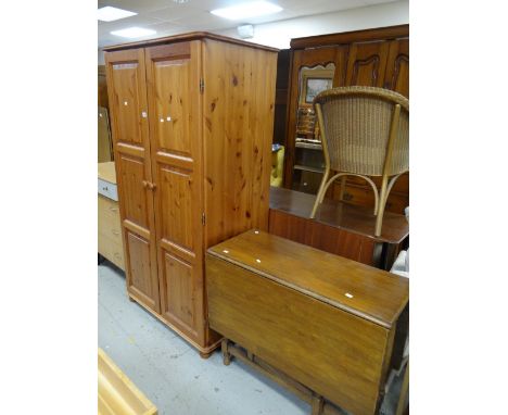 A double pine wardrobe and a gate-leg table Condition reports provided on request by email for this auction otherwise items p